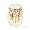 Trinkbecher stammloses Weinglas mit goldenem Aufkleber trinken